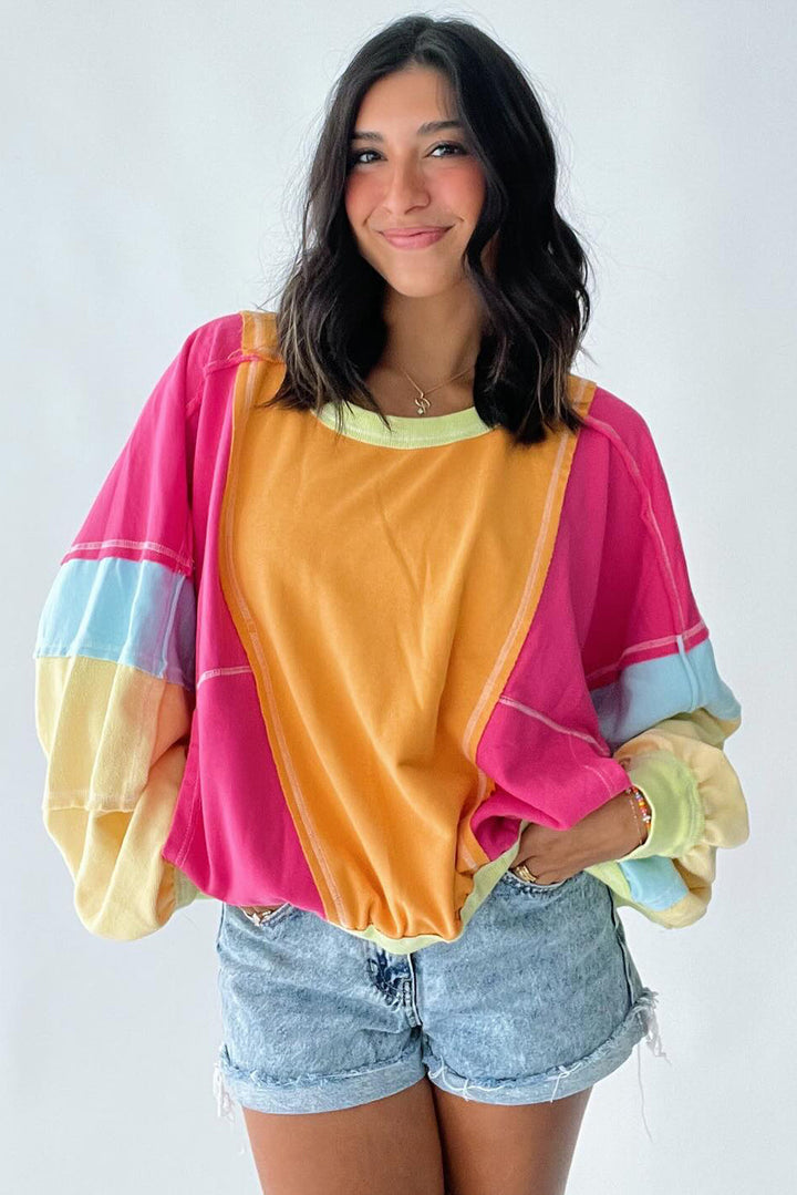 Cécile – Pull colorblock rose en grande taille avec patchwork et coutures apparentes