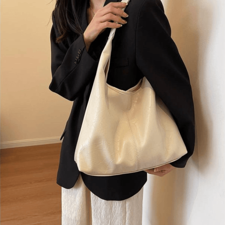 Sac à Bandoulière en Cuir Vieilli – Élégance Rustique et Pratique