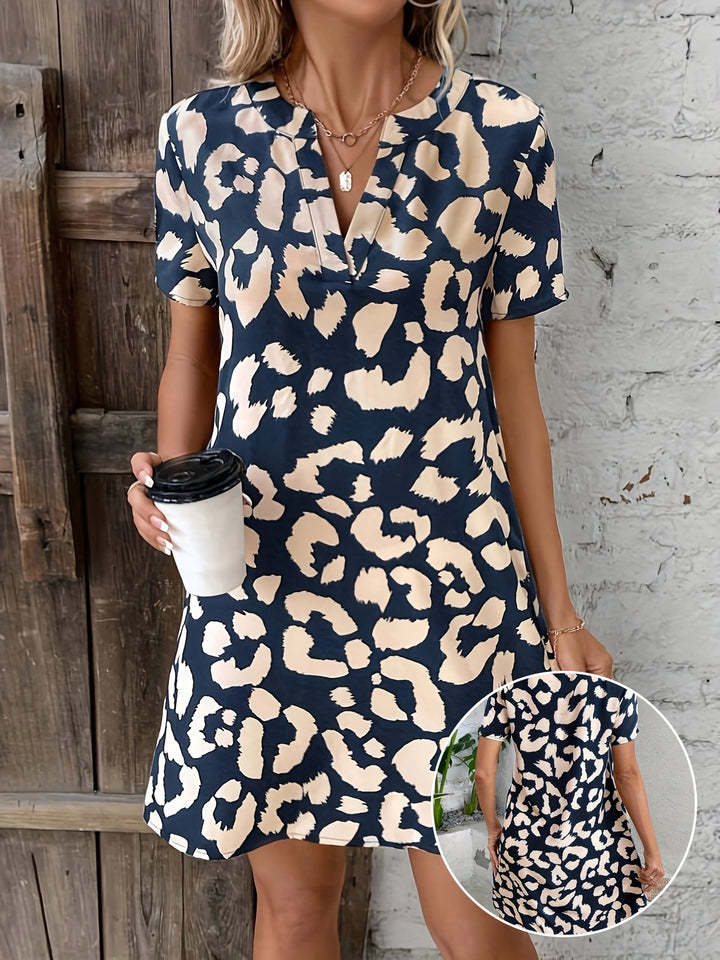 Vestito elegante con stampa leopardata, scollo a V e maniche corte