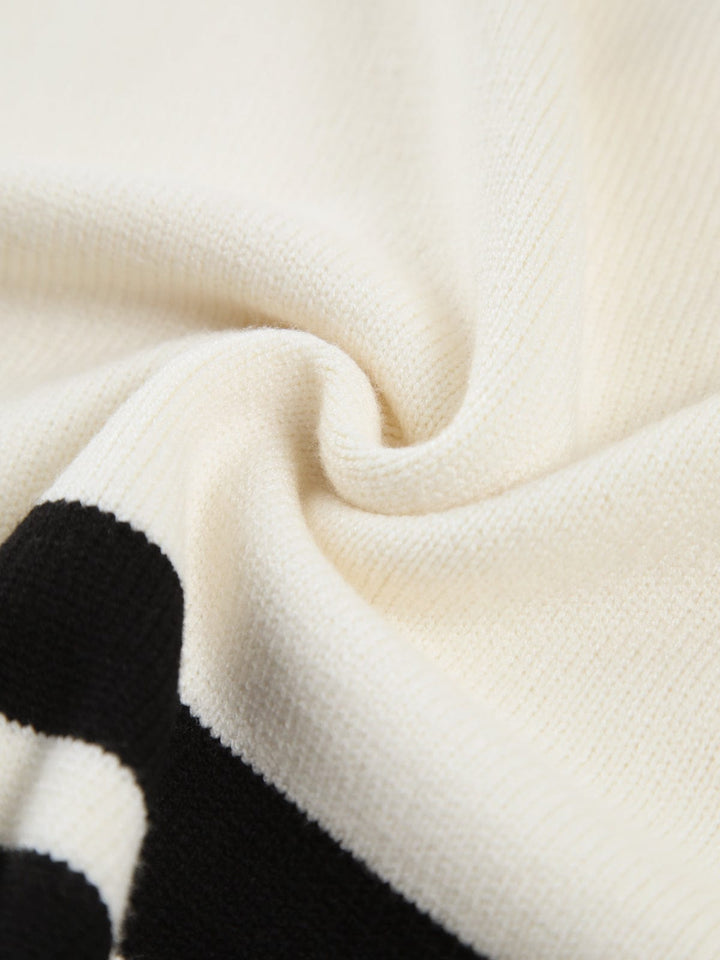 Geneviève - Pull à motifs rayés avec col montant