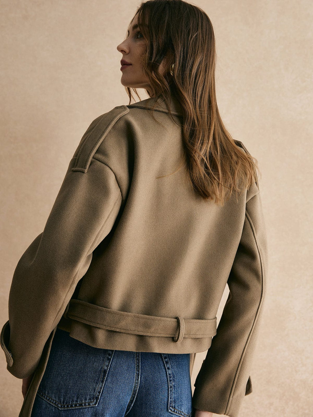 Veste chaude avec ceinture unie.