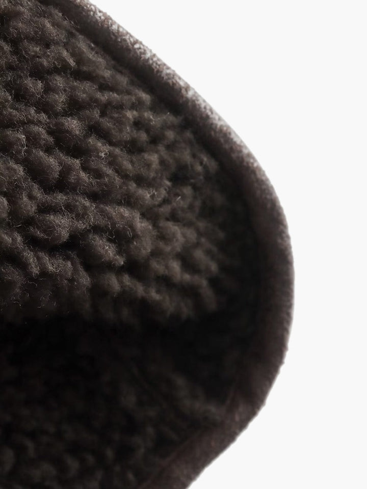 Veste chaude en cuir synthétique avec fermeture à boutons