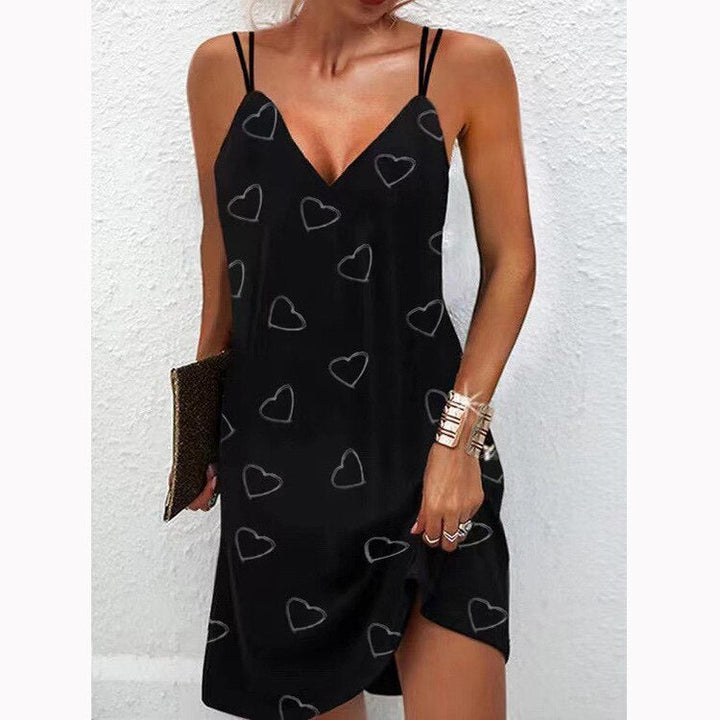 Robe Courte à Bretelles Imprimé Plumes – Look Léger et Bohème pour Été et Vacances
