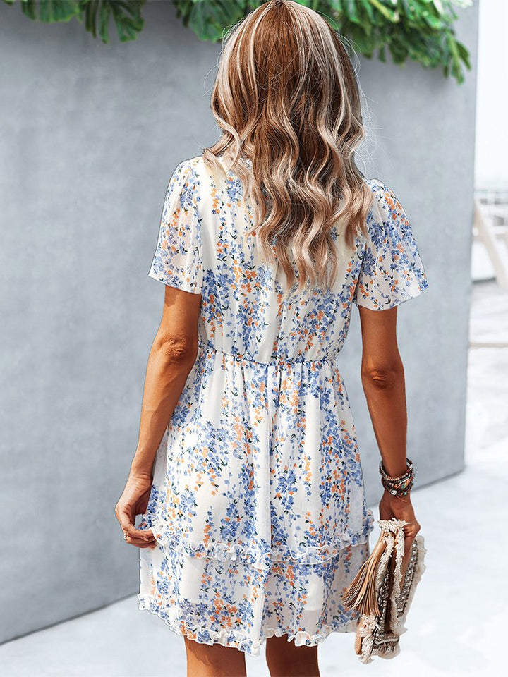 Weißes Kleid mit Blumenmuster