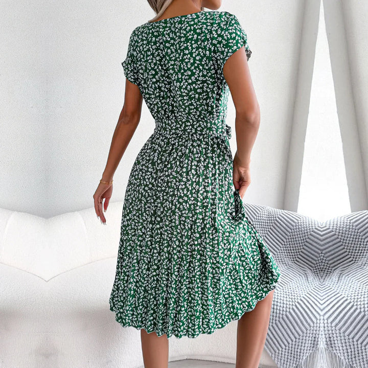 Robe Mi-Longue Plissée à Imprimé Fleuri – Style Bohème Chic avec Ceinture Taille
