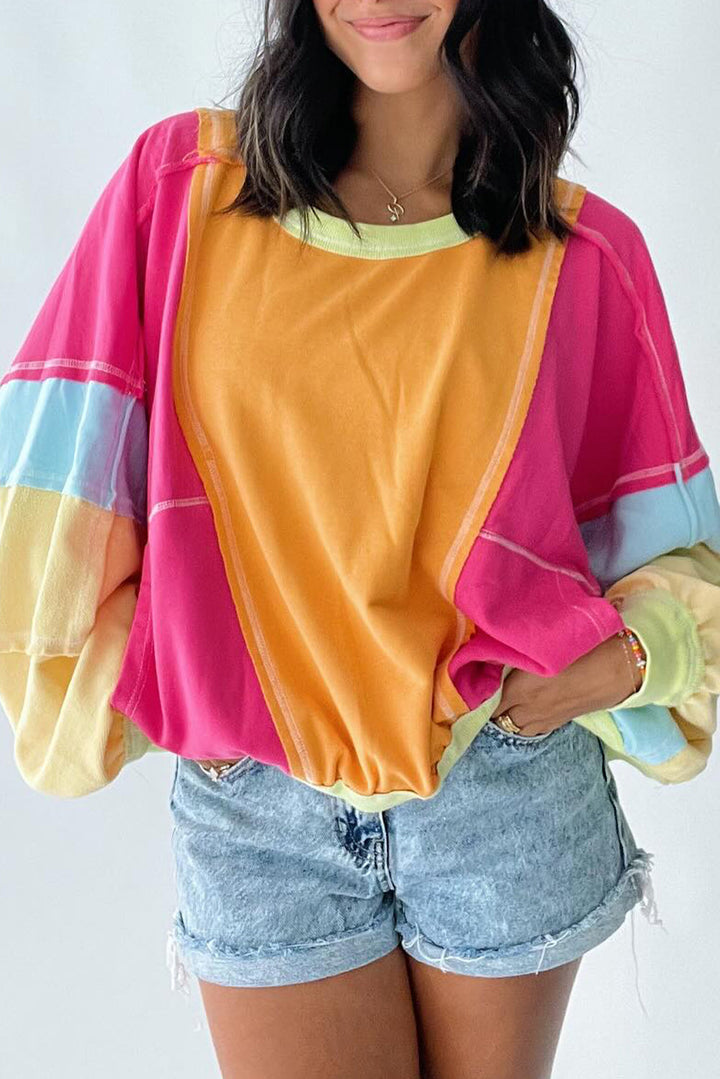 Cécile – Pull colorblock rose en grande taille avec patchwork et coutures apparentes