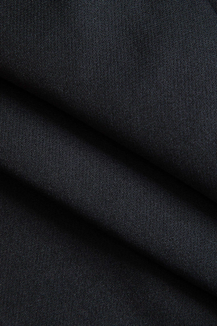 Blazer ceinturé à col à revers