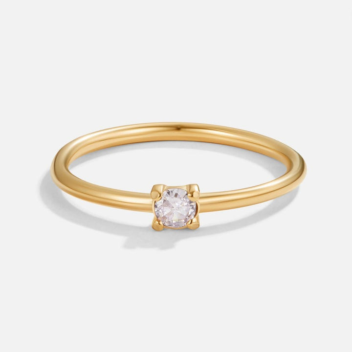 Bagues en or 18 carats ornées de pierres.