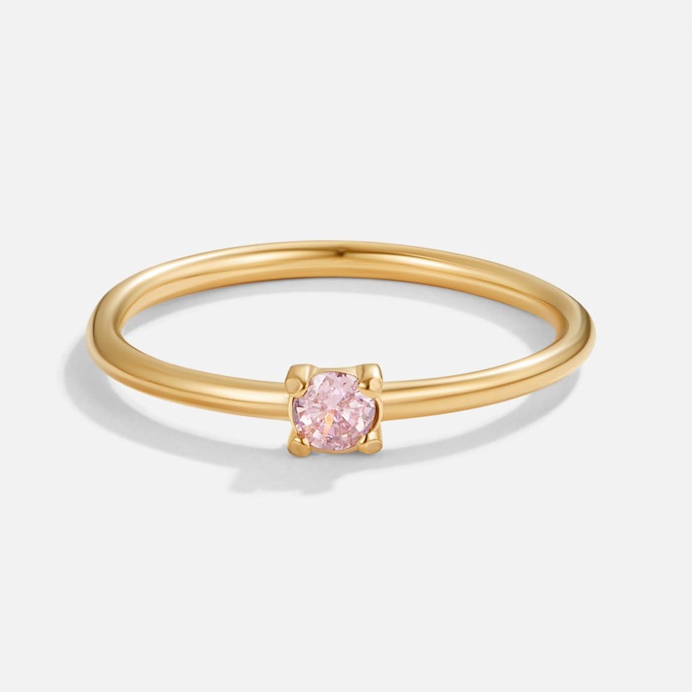 Bagues en or 18 carats ornées de pierres.