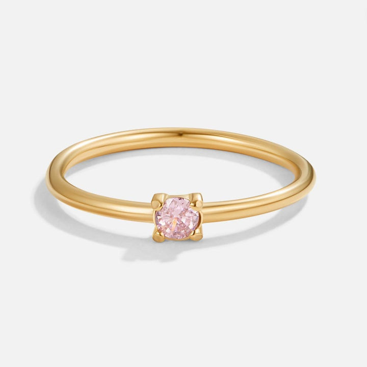 Bagues en or 18 carats ornées de pierres.