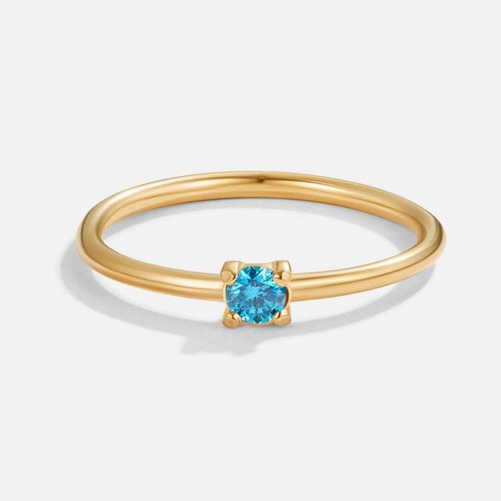 Bagues en or 18 carats ornées de pierres.