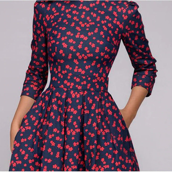 Rotie | Vestito rosso a pois con maniche a tre quarti