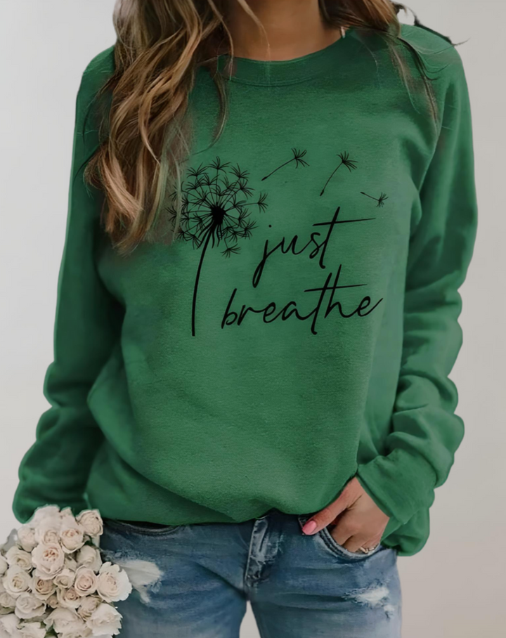 Sara – Pull oversize à col rond avec inscription "Just Breath"